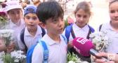 Niños, cofradías y hermandades acuden a la ofrenda floral del Corpus