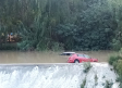 Una riada en Alcalá del Júcar (Albacete) arrastra numerosos coches hasta el río