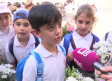 Niños, cofradías y hermandades acuden a la ofrenda floral del Corpus