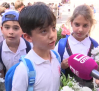 Niños, cofradías y hermandades acuden a la ofrenda floral del Corpus