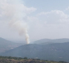El humo del incendio forestal de Los Navalucillos (Toledo) obliga a cortar la carretera CM-4155