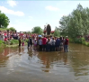 Encuentro en el río entre la Virgen del Rosario y San José Obrero en Tirteafuera