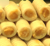 Los buñuelos de viento y los huesos de santo, los dulces protagonistas de estos días