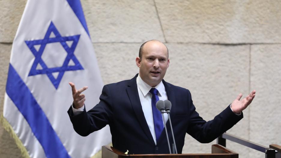 Jerusalem (---), 13/06/2021.- Leader of the Yemina party and designated prime minister Naftali Bennett speaks during a special voting session on the formation of a new coalition government at the Knesset Plenum, at the Knesset, Israeli parliament, in Jeru