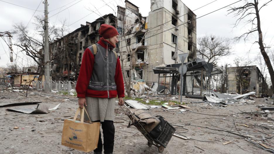 MARIUPOL, April 19, 2022  -- A resident walks near damaged buildings in Mariupol on April 18, 2022.,Image: 684196456, License: Rights-managed, Restrictions: , Model Release: no, Credit line: Bai Xueqi / Xinhua News / ContactoPhoto
Editorial licence valid 