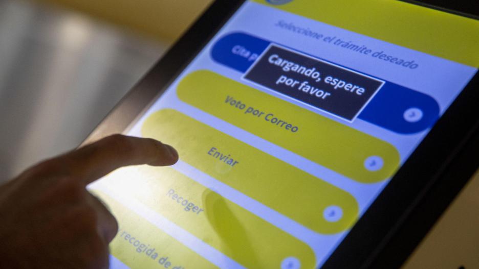 Plataforma de Correos para pedir turno en una oficina postal de Madrid