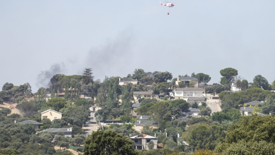 TOLEDO, 23/07/2026.- Vista de la zona afectada por el incendio originado este jueves en la localidad toledana de Almorox, que obligó a evacuar varias urbanizaciones, ha quemado total o parcialmente al menos 26 viviendas, la mayoría en la Comunidad de Madrid. EFE/Mario Morón Pereira